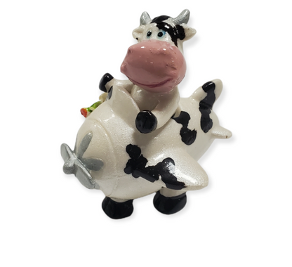 Favores de fiesta de bebé piloto de vaca de porcelana #7D3613